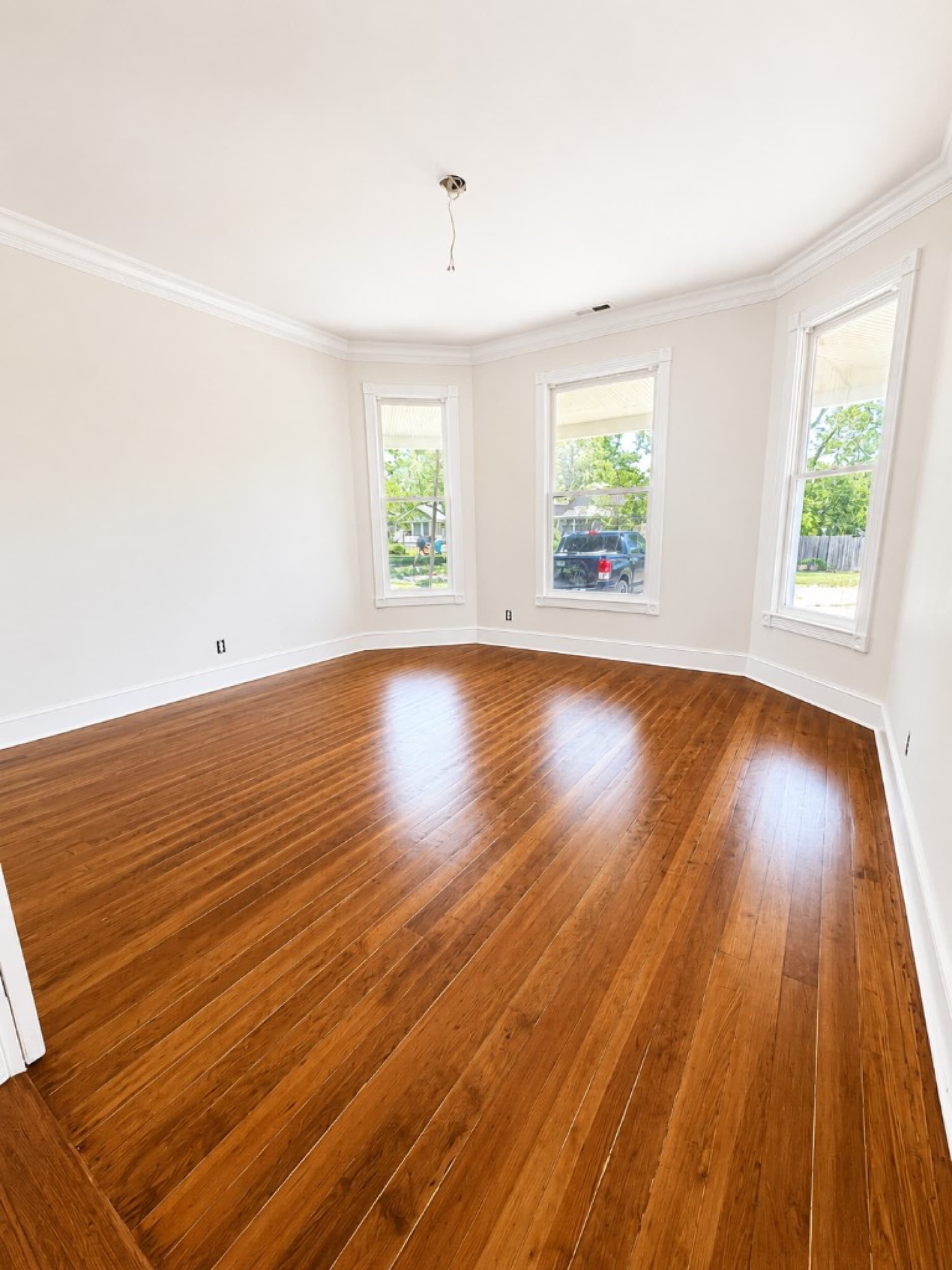 Z Tucker Properties — hardwood flooring with bay windows