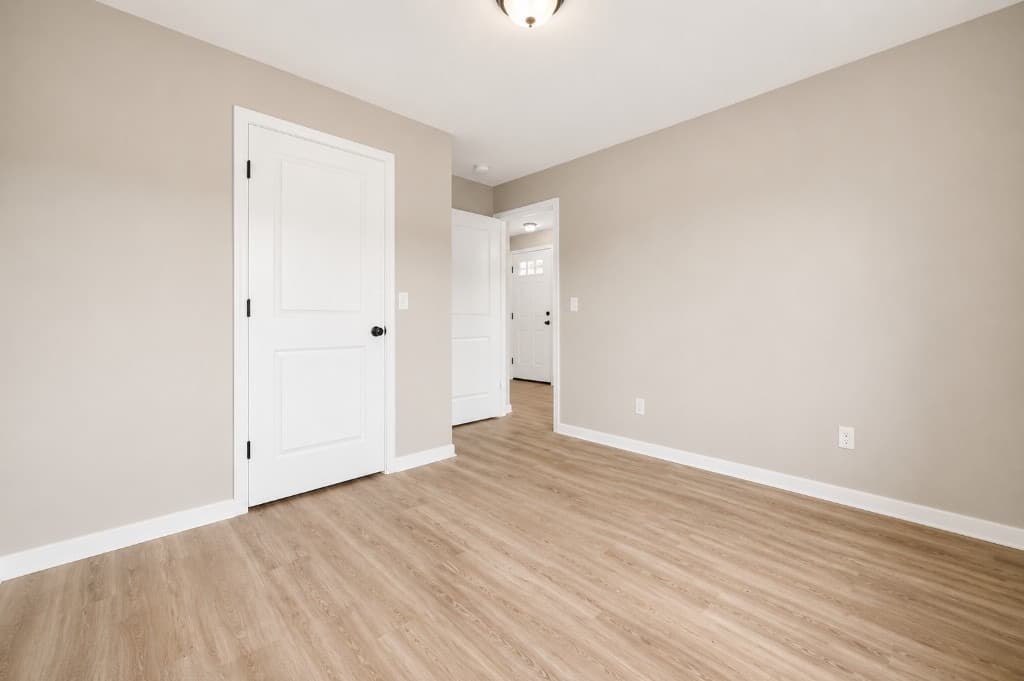Clear Creek Properties — unit entry with LVP flooring and interior doors