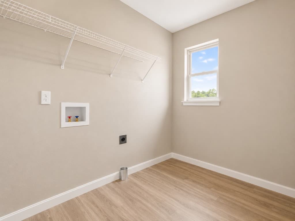 Clear Creek Properties — laundry room with LVP flooring
