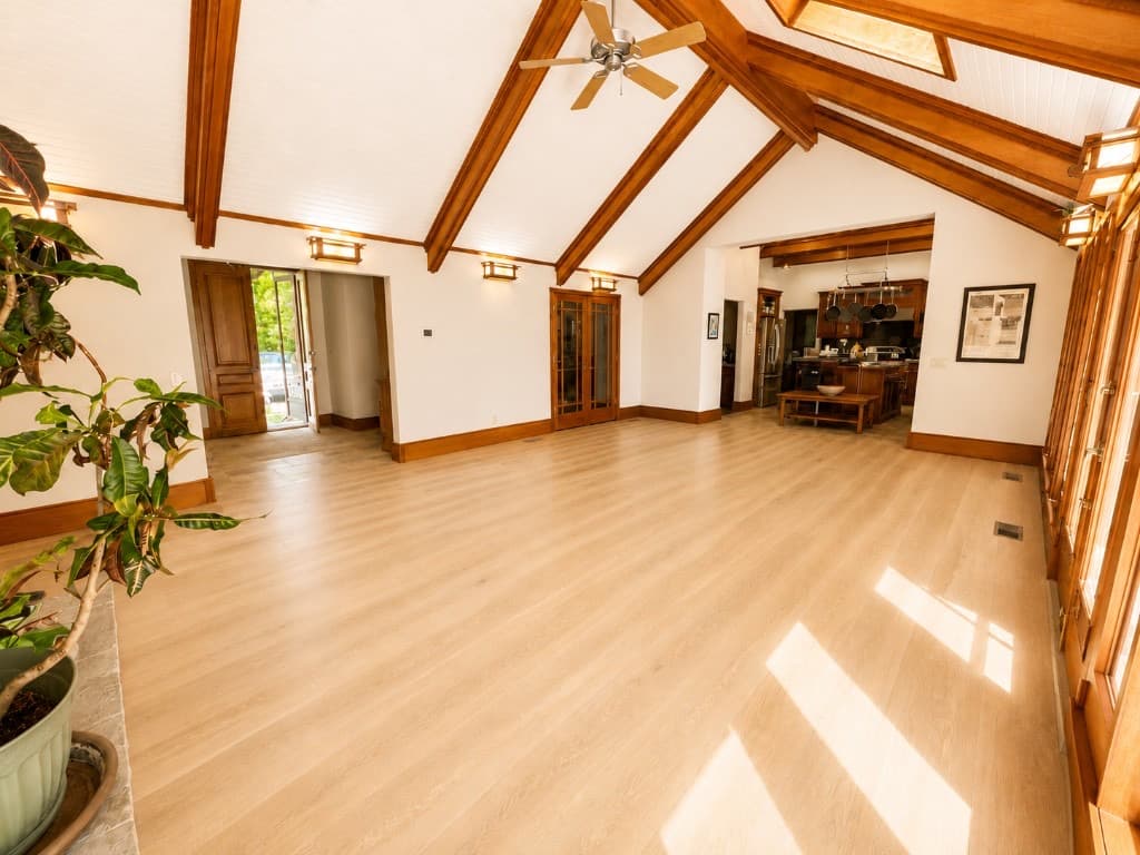 Stoneridge Flooring Designs — hardwood flooring throughout great room and kitchen