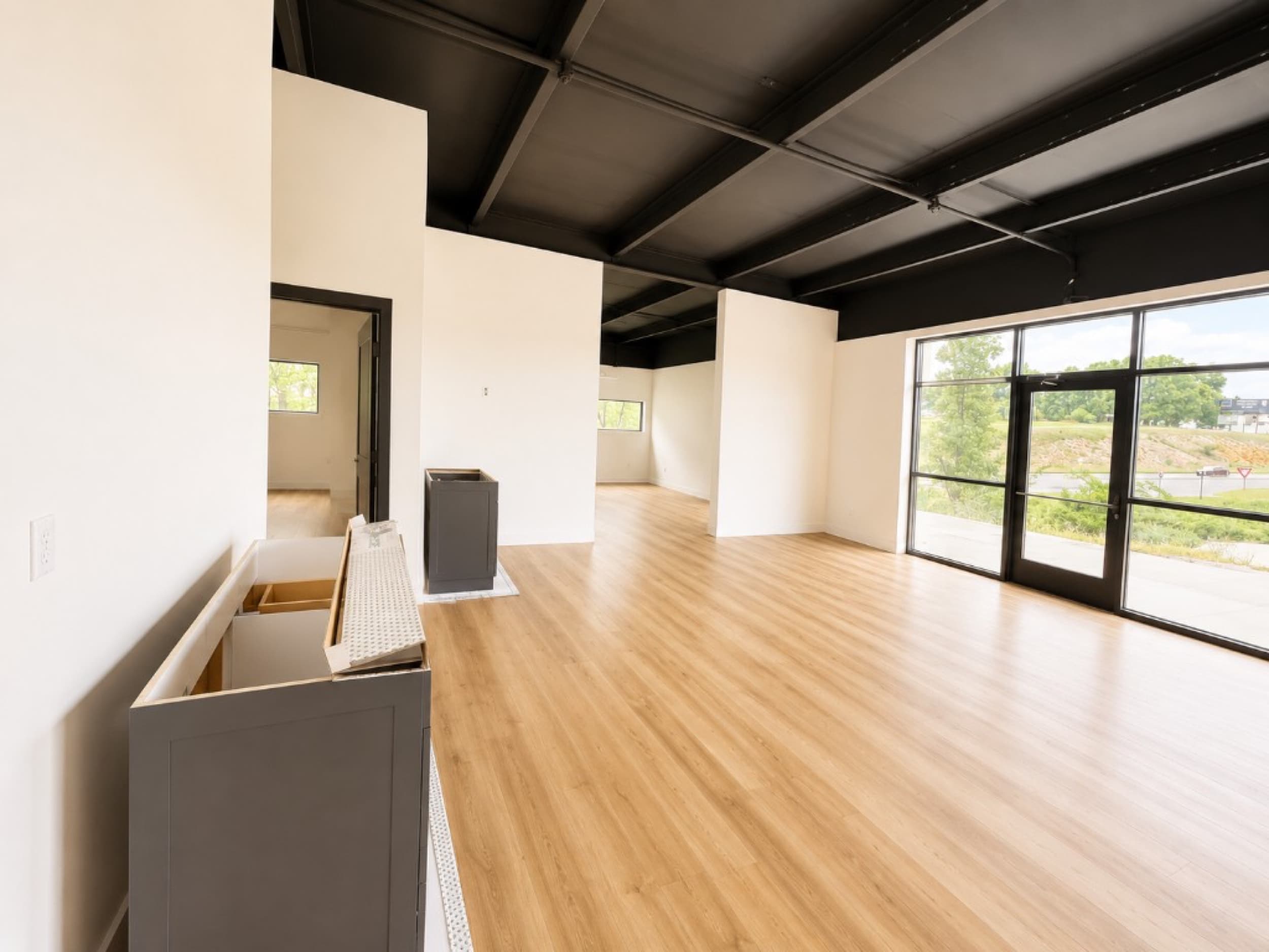 Kinsman Construction — finish package with LVP flooring and cabinet installation
